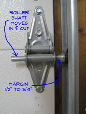 How do you adjust a garage door?