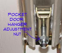 Adjusting pocket doors